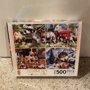 Four 500 piece puzzle set